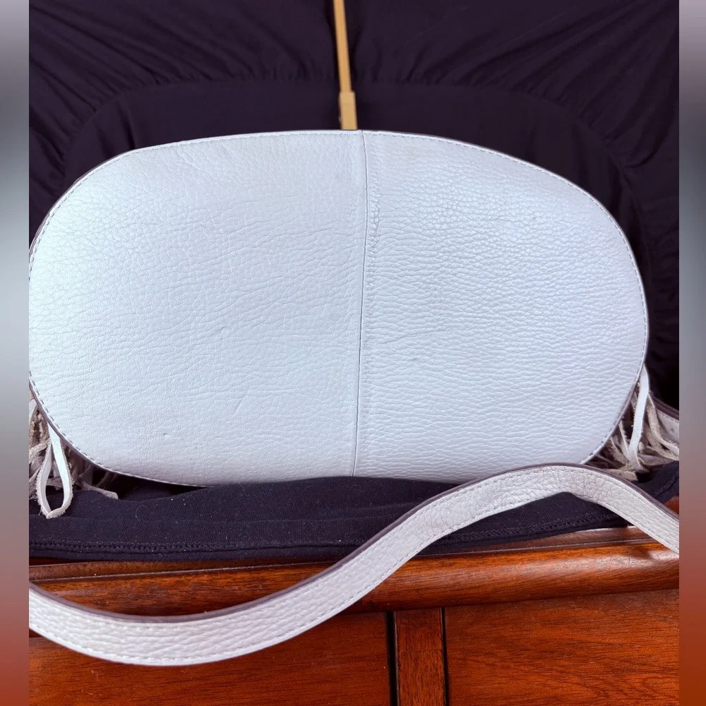 G.I.L.I. Got It. Love It. White Pebbled Leather Drawstring Hobo Tassel